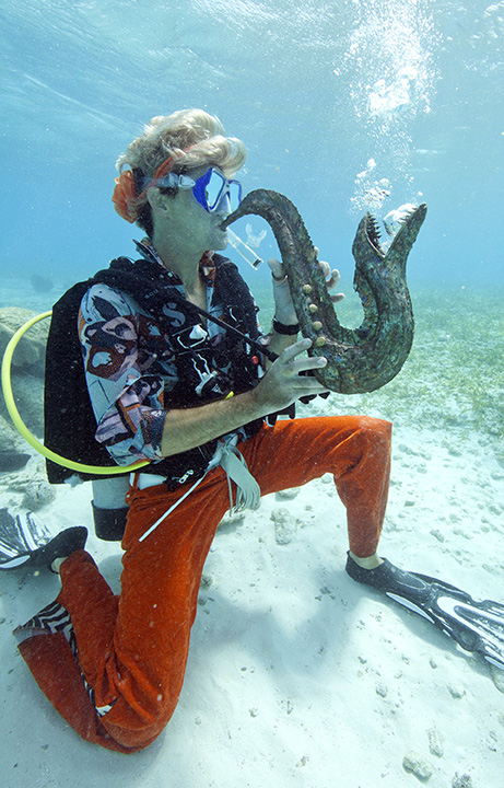A diver plays a fish-shaped saxophone in the Lower Keys.