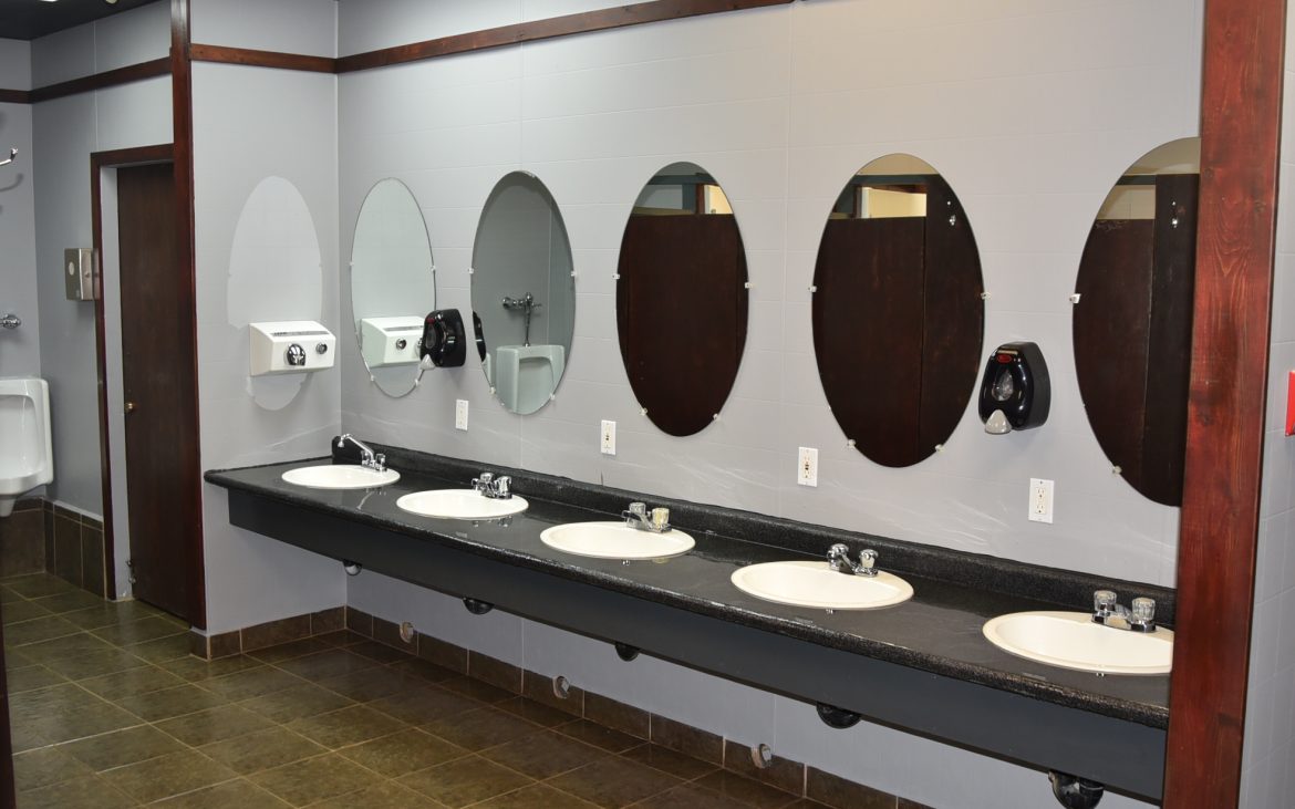 Multiple sinks and mirrors in public restroom