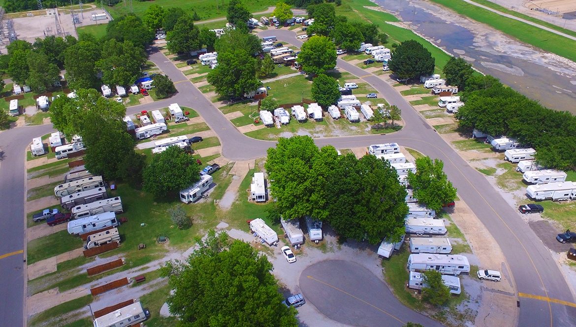 Aerial view of many RVs parked along road