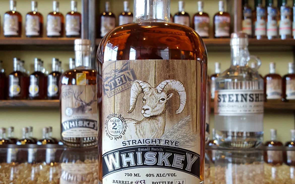 Bottle of whiskey on bar at distillery