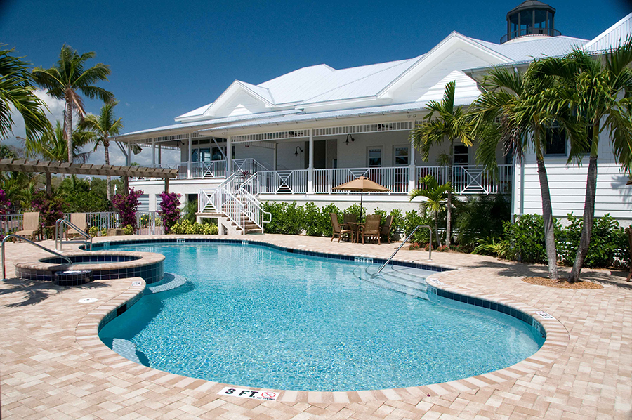 A pool shimmers in the sun at Everglades Isle Motorcoach Resort & Marina.