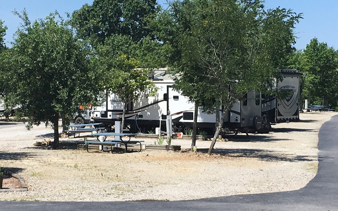 Trailers parked in dirt spots