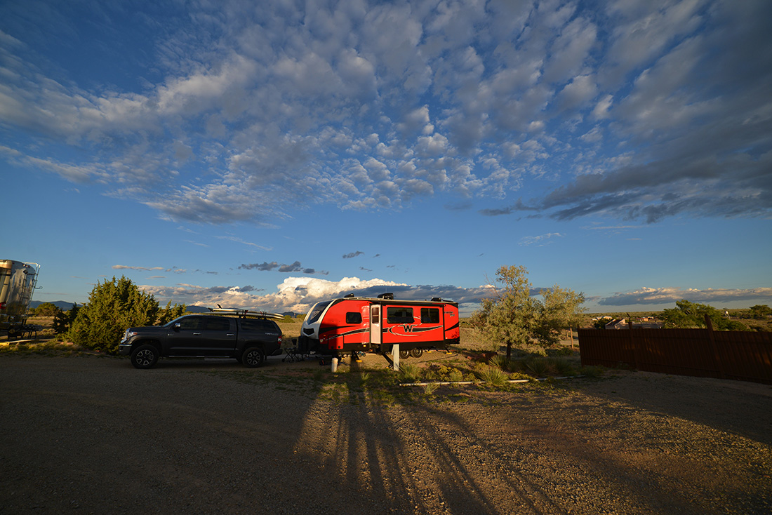 The sunset casts long shadows at Santa Fe Skies RV Park in Santa Fe, New Mexico.