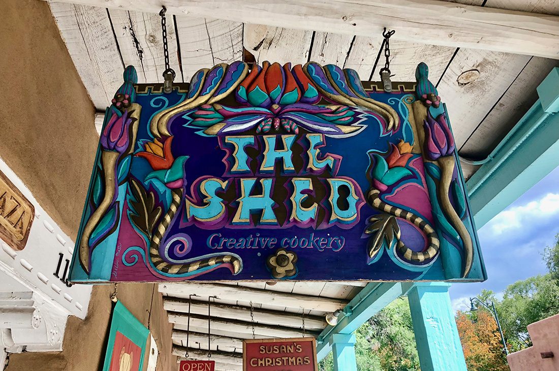 A colorful sign of The Shed restaurant in Santa Fe.