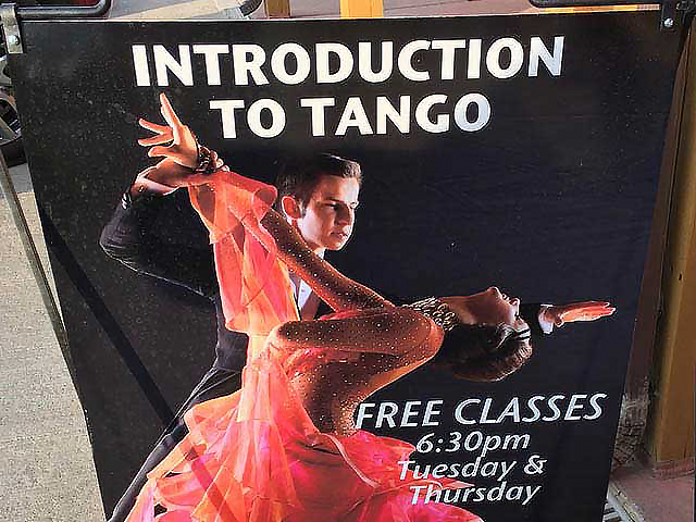 A poster promoting an "Introduction to Tango" class at the resort.
