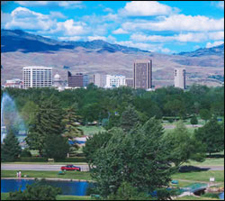 golf-course-and-boise-idaho-skyline-backed-by-mountains