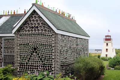 The Bottle House with the Lighthouse Overlooking Egmont Bay