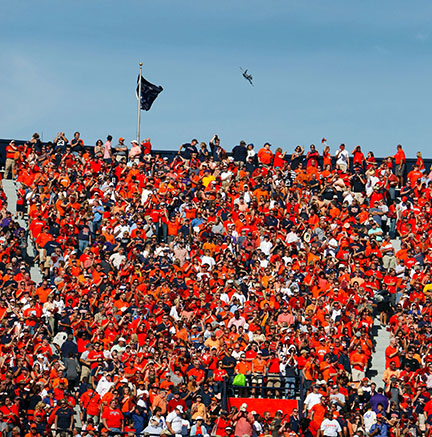 A sea of orange fills the stands at an Auburn game.