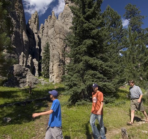 Hiking past the Needles rock formations in Custer State Park.