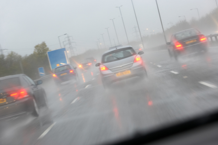 Cars driving in rain on highway