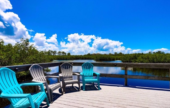 Bay Bayou RV Resort - deck side by the lake