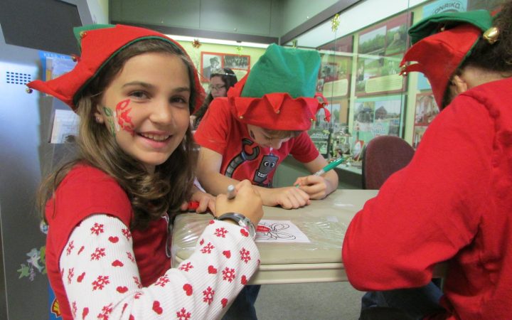 Iberia Parish - kiddos making Christmas crafts.