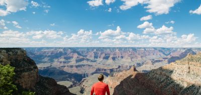 Man overlooking epic view of the Grand Canyon National Park