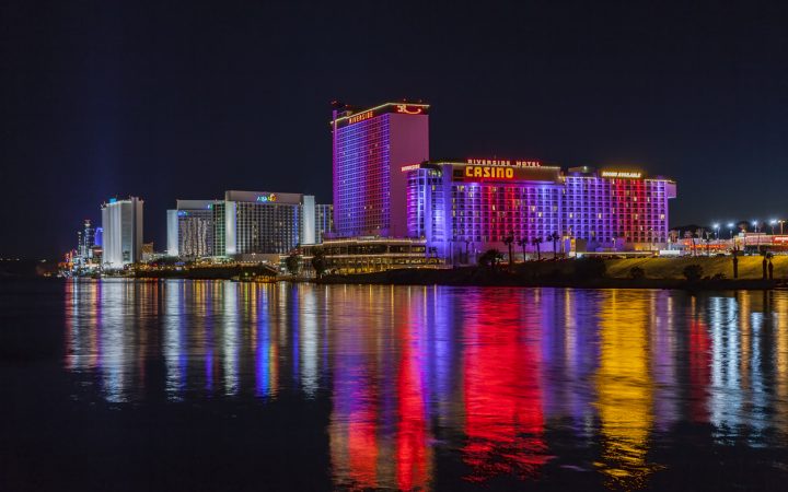 Laughlin's famous colorful casino resort waterfront at night.