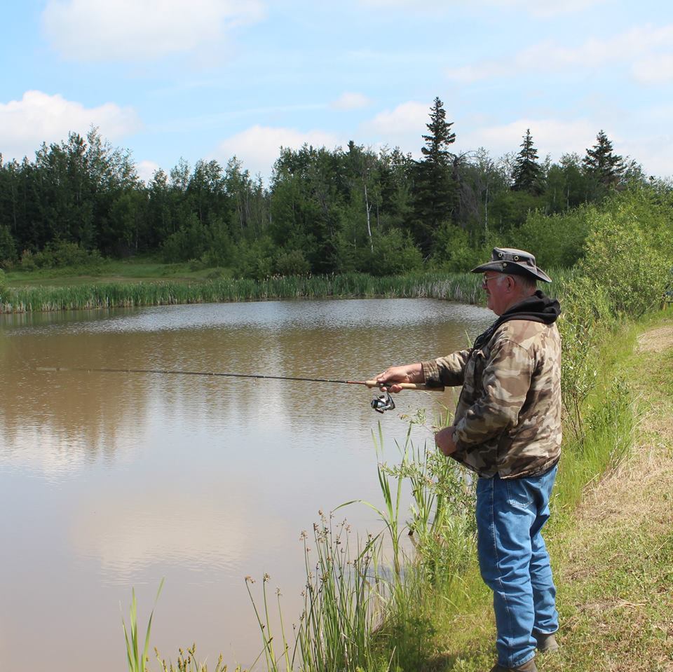 Memory Lane Campground and RV Park - man fishing