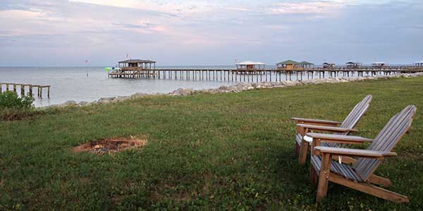 Alabama Scenic River Trail with wooden outdoor chairs on grass 