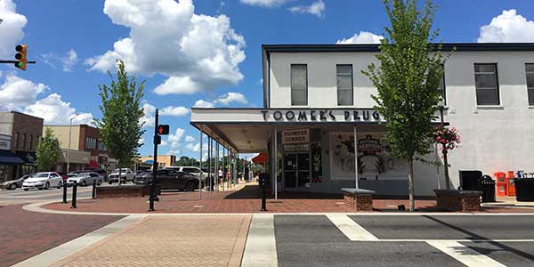 Toomer’s Drugs building on street corner of Auburn