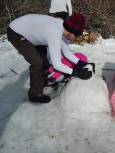 Infamousworks videographer Colin Foster preparing a snowball for battle.