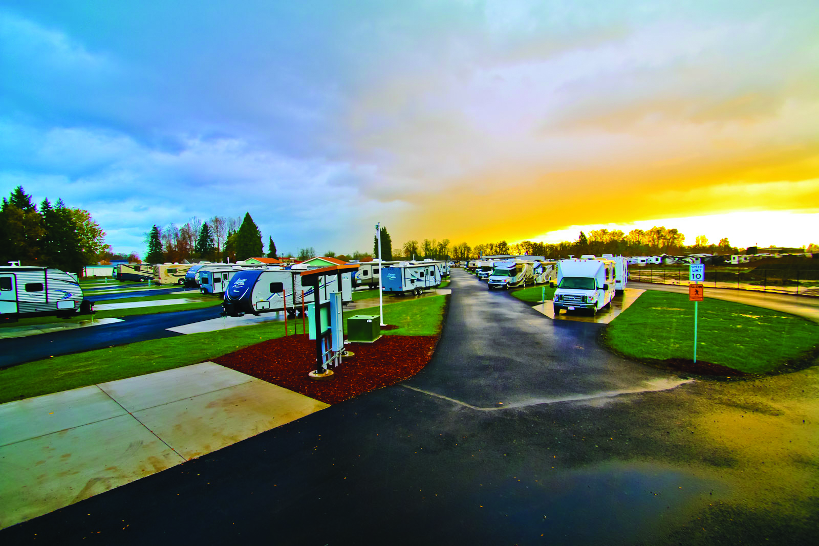 Sunset picture of RV's parked at Guaranty RV Park