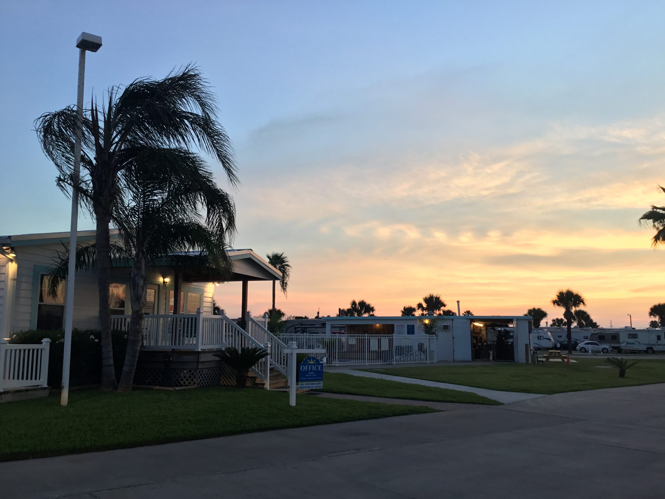 Sunset view of RV's parked at Island RV Resort in Texas