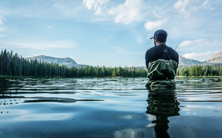 Man fishing in lake