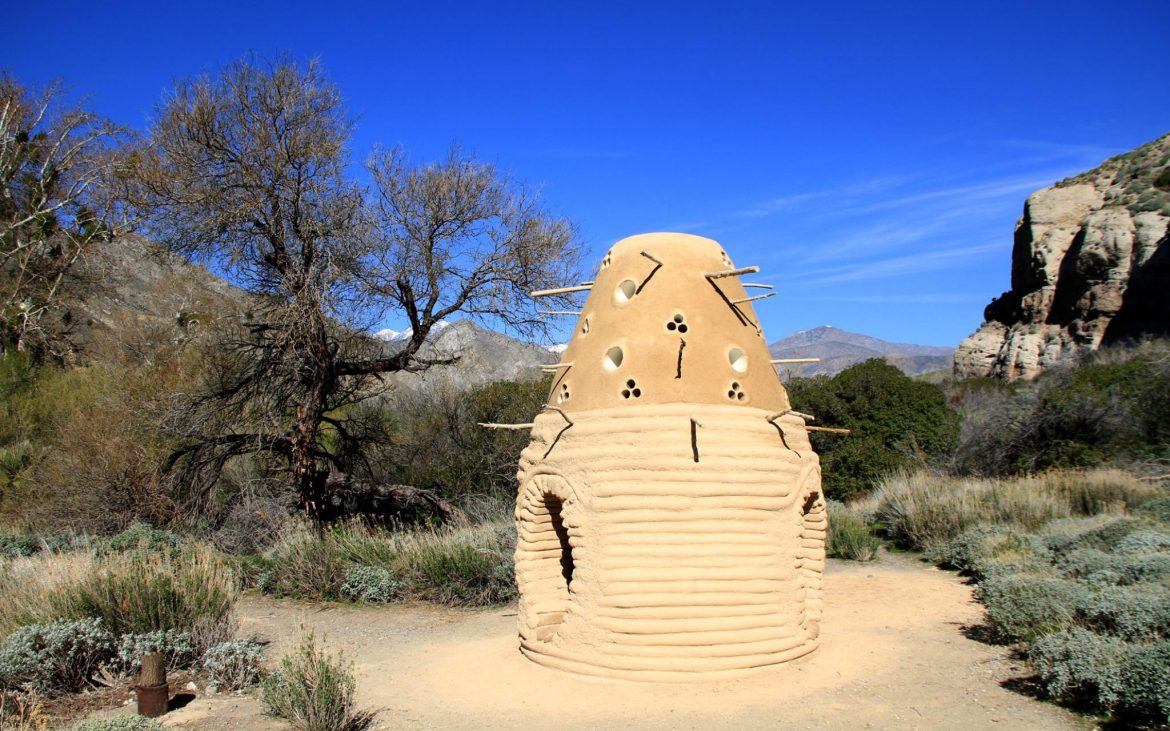 "One I Call" bird art instillation at White Water Preserve on a blue sky sunny day