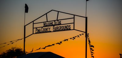 Sunsetting behind the Pima Fairgrounds Sign