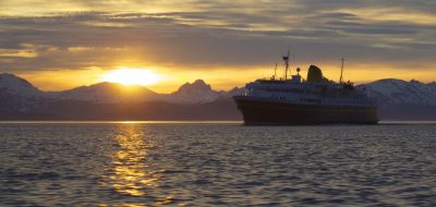 Cruise ship in the Alaskan water during the sunset