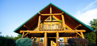 Wooden cabin-style clubhouse of the Bissell's Hideaway Resort
