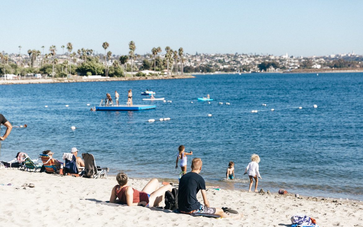 People relaxing on the beach in San Diego