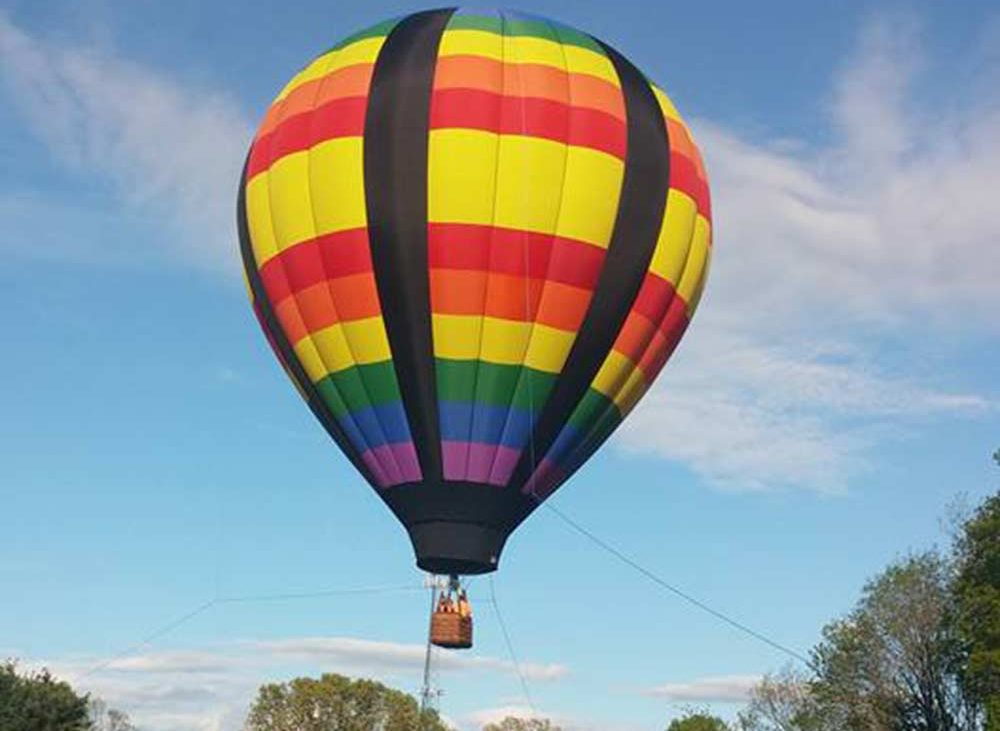colorful air balloon with basket