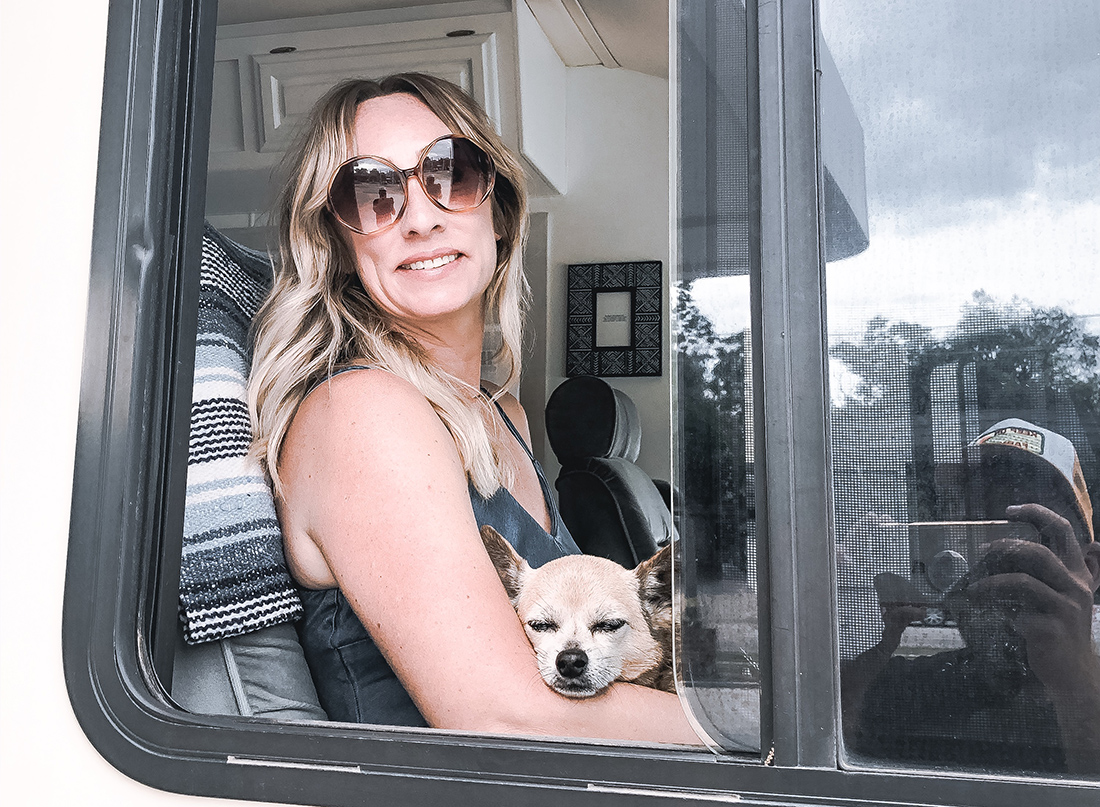 Relaxing with a chihuahua in the motorhome.