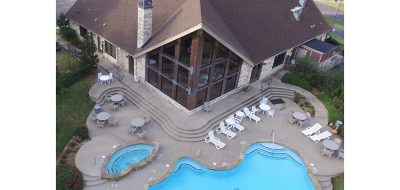 Aerial view of inviting resort pool and spa