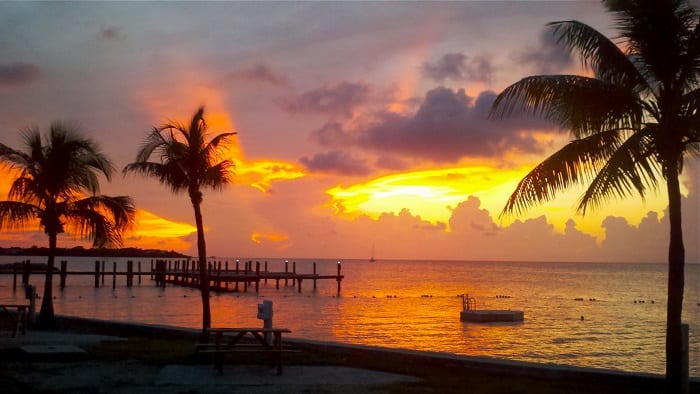 A golden sunset over a tropical beach in the Florida Keys.