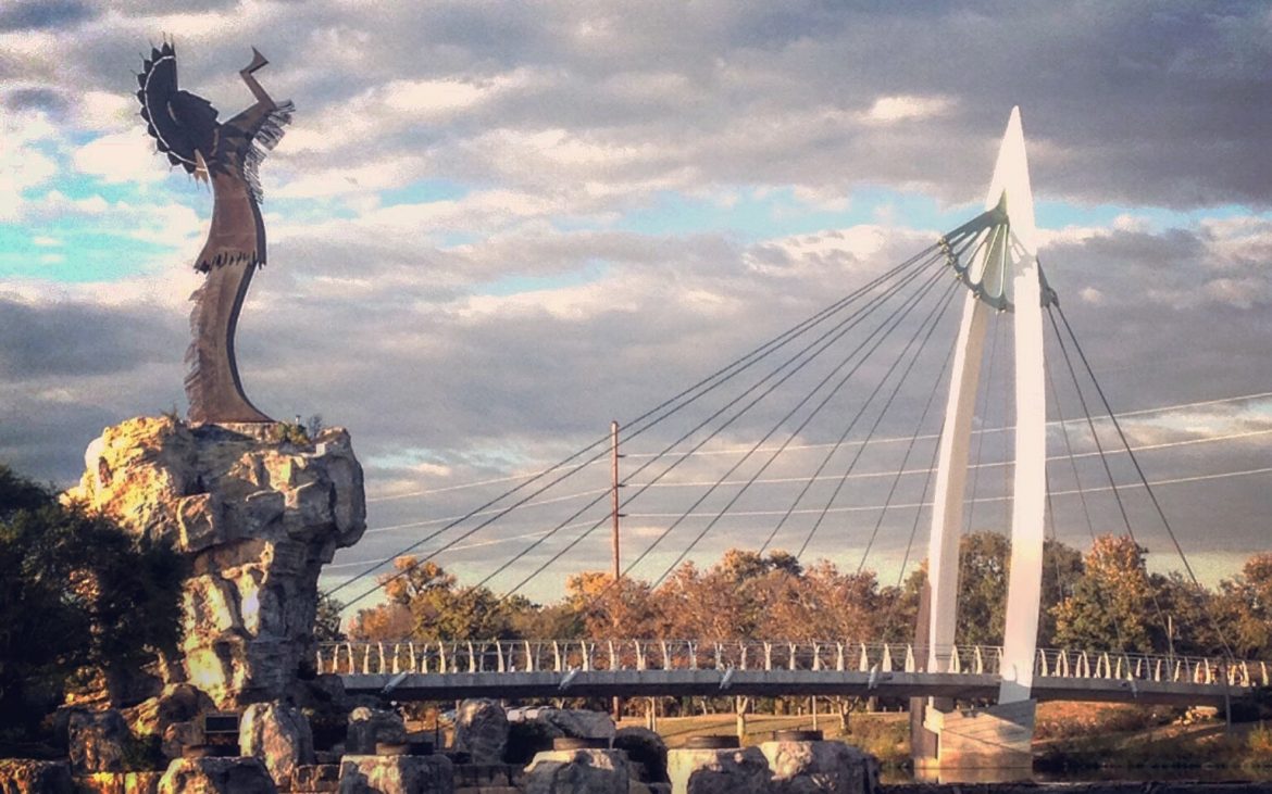 Keeper of the Plains sculpture with bridge