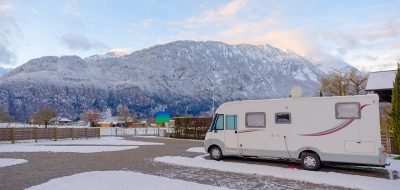An RV camping in the snow