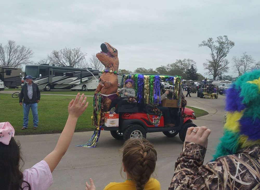 Paragon Casino RV Resort in Louisiana — a Mardi Gras float with a dinosaur