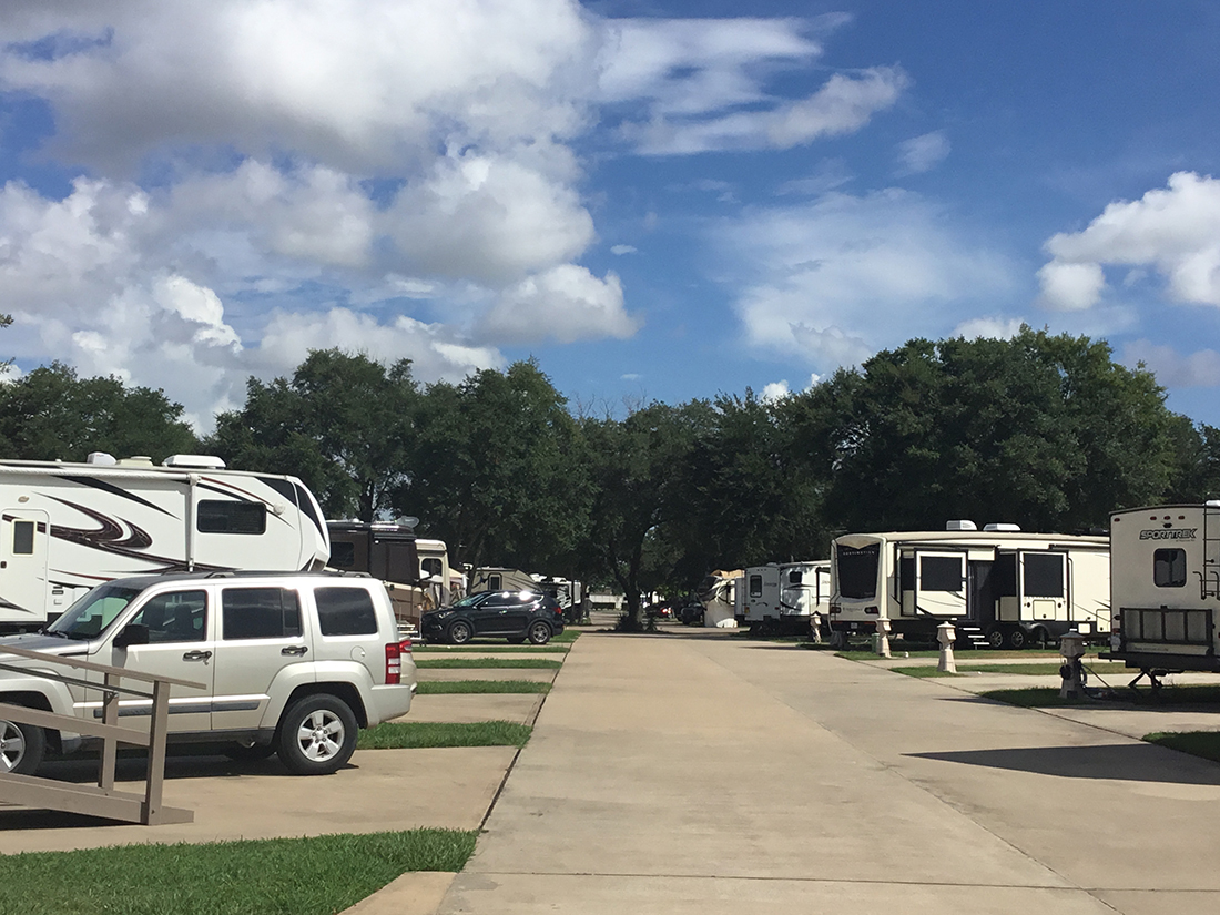 A look down a street in the campground lined with RVs.