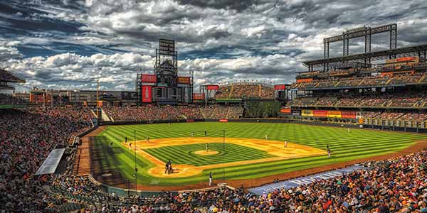 Fans turn out to see the Colorado Rockies play Major League Baseball at Coors Field.
