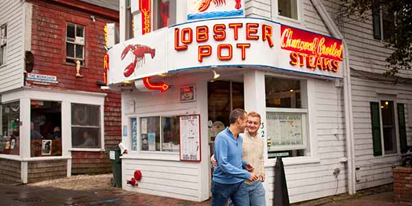 Two guys passing in front of the Lobster Pot