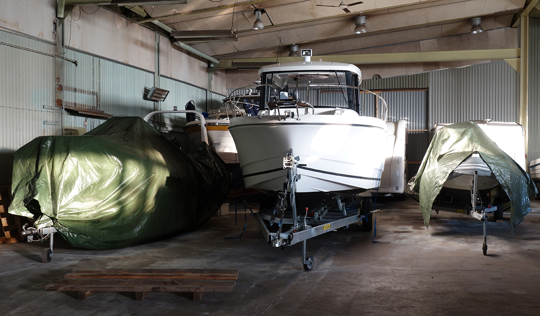 Boats in indoor winter storage facility