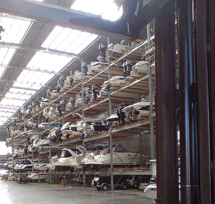 Boats Stacked in indoor storage facility. 