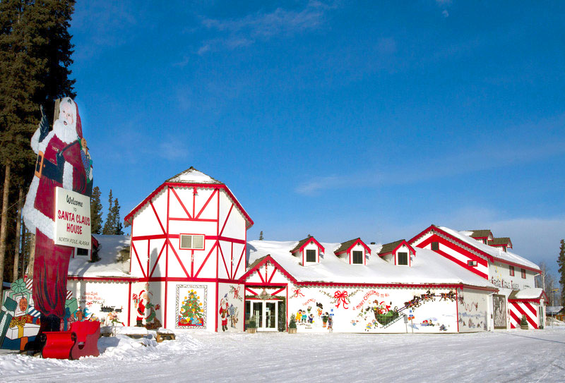 A red and white Santa House in tudor style.