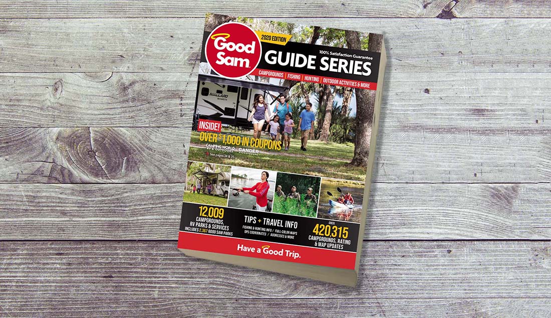 Good Sam Guide Series 2020 Edition on a wooden table.