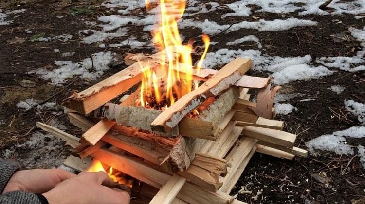 Log cabin fire Fire stacked in log cabin formation.