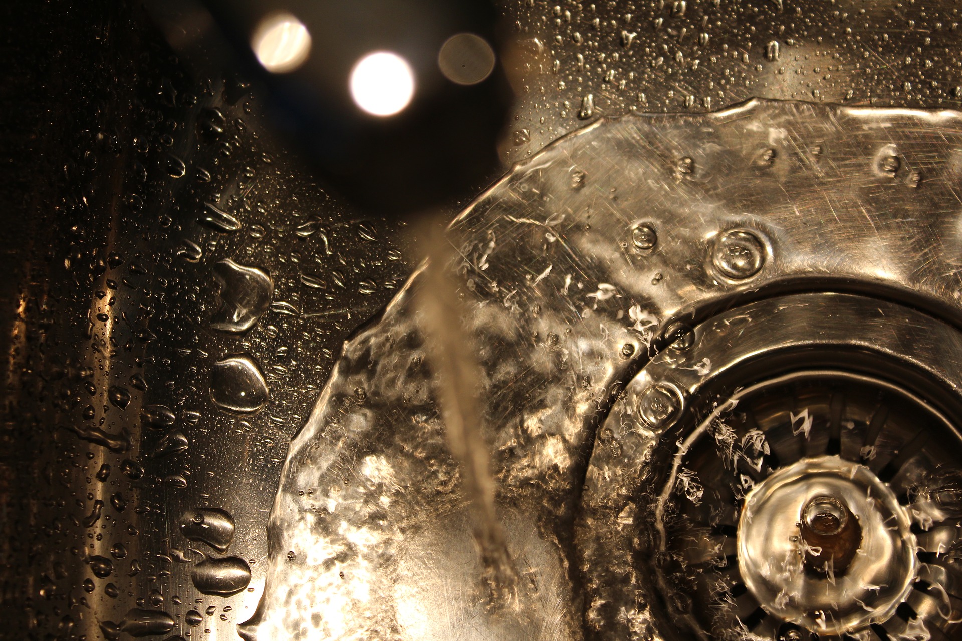 Water flowing down a sink