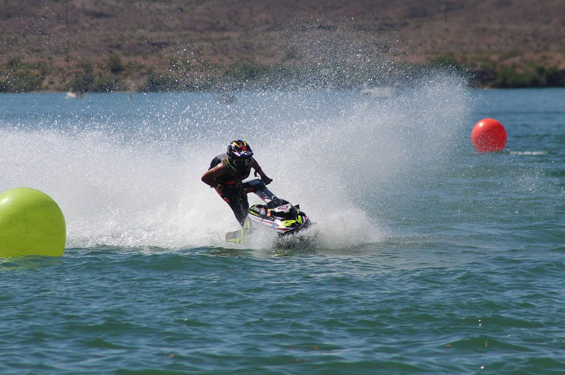 A jet ski zooms across the water.