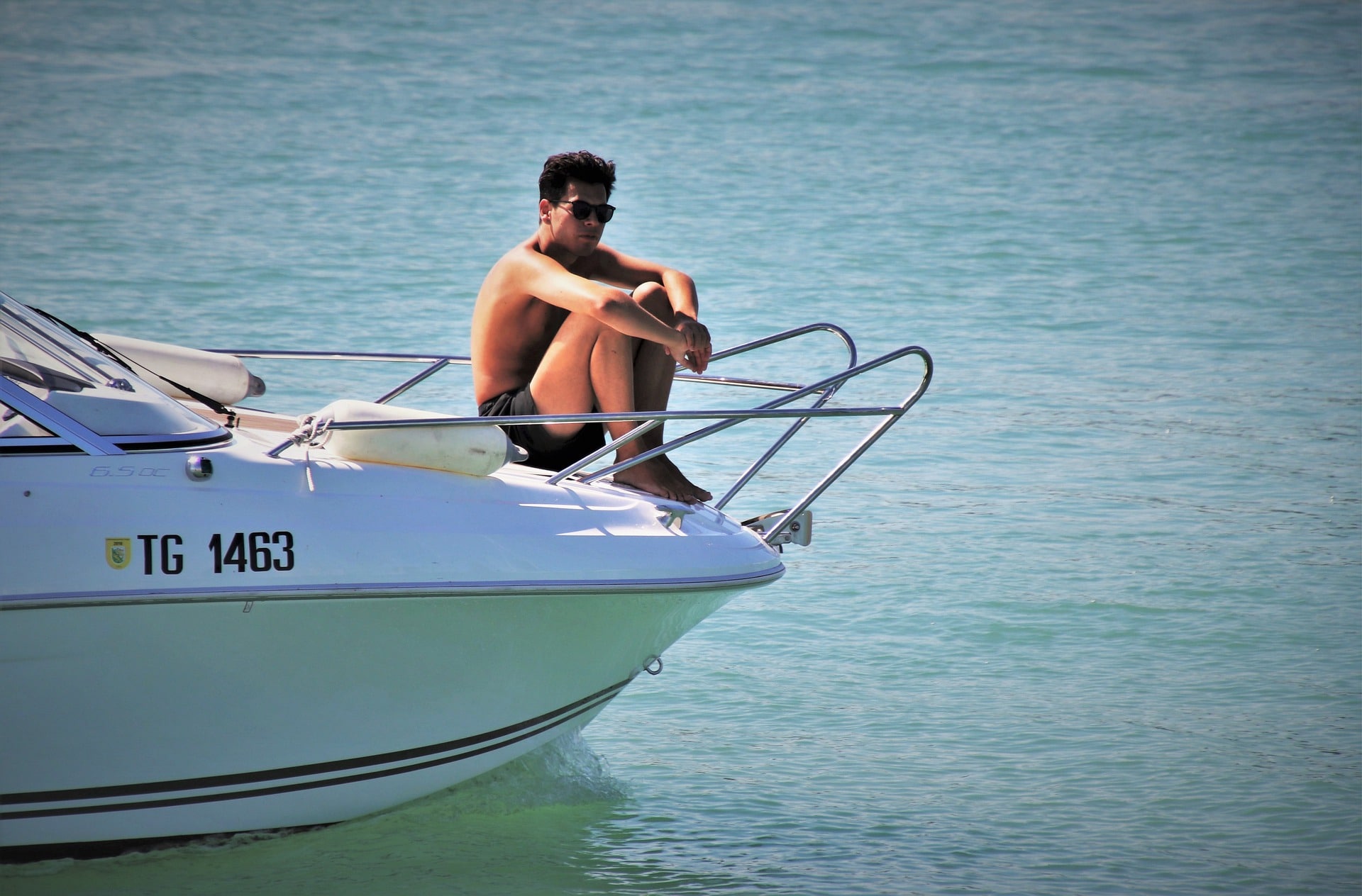 Man lounging in Boat