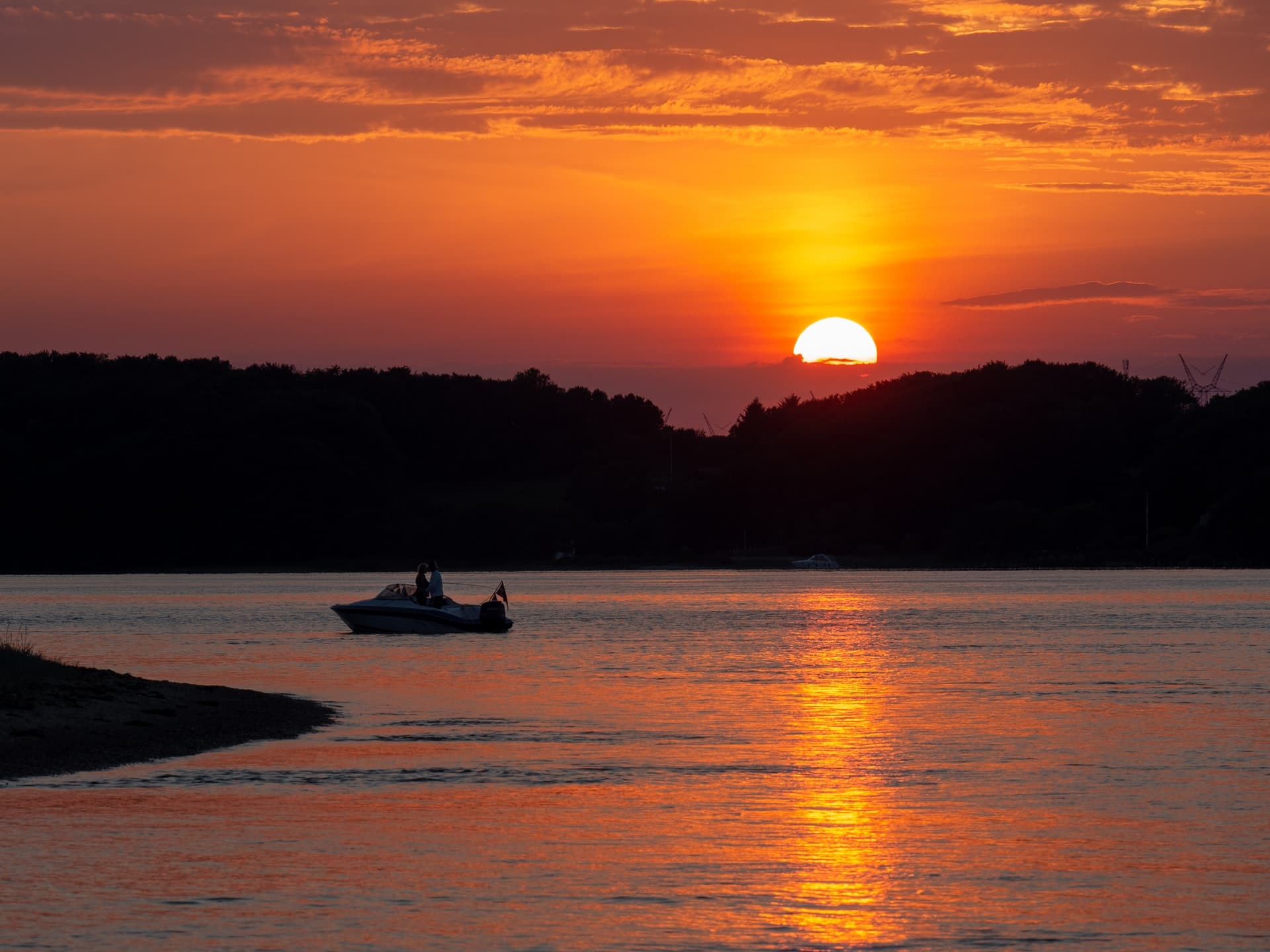 Boat in sunset. 