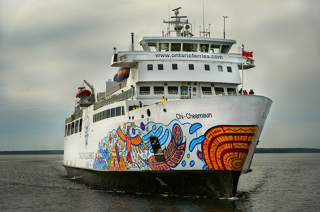 Ship with colorfully painted hull.